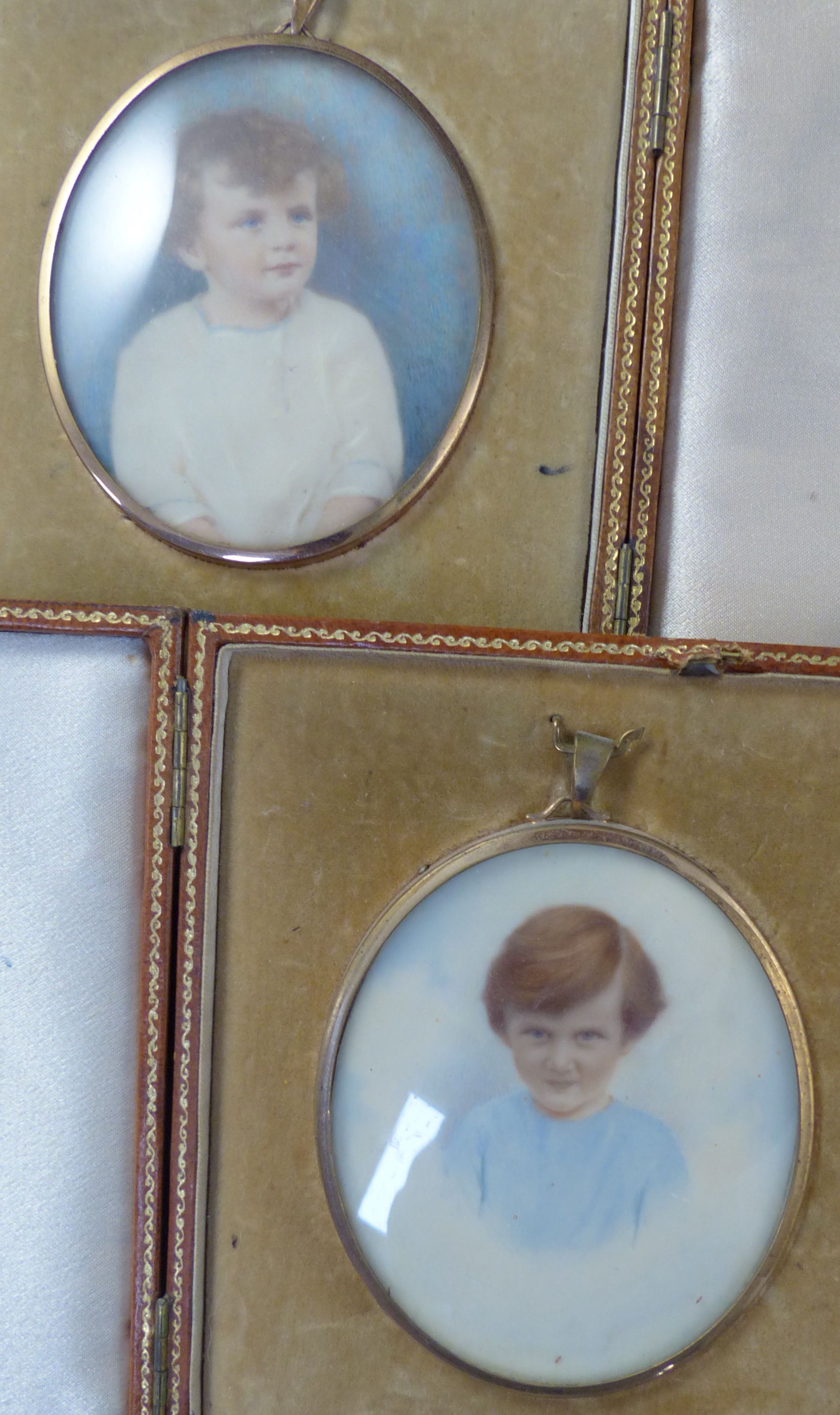 Two colour tinted miniature photographs of an infant boy and girl, cased and a collection of Asian gilt lacquer boxes and animal figure